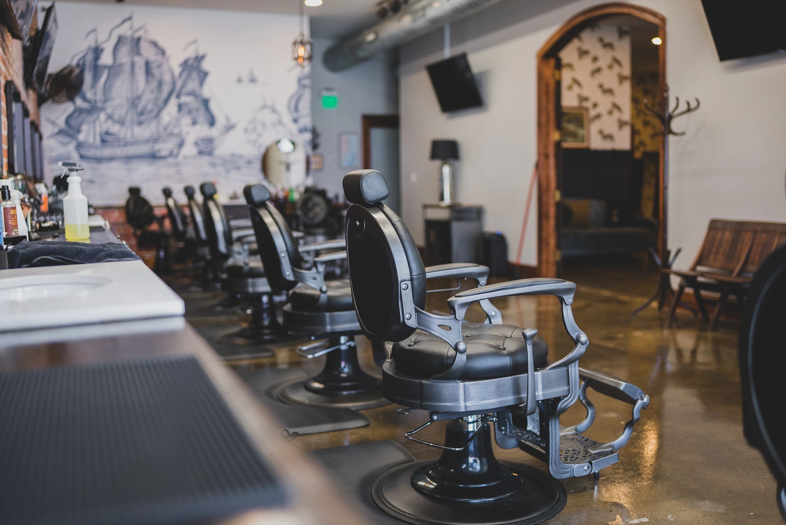 Classic barber chairs inside The Shave on Fifth